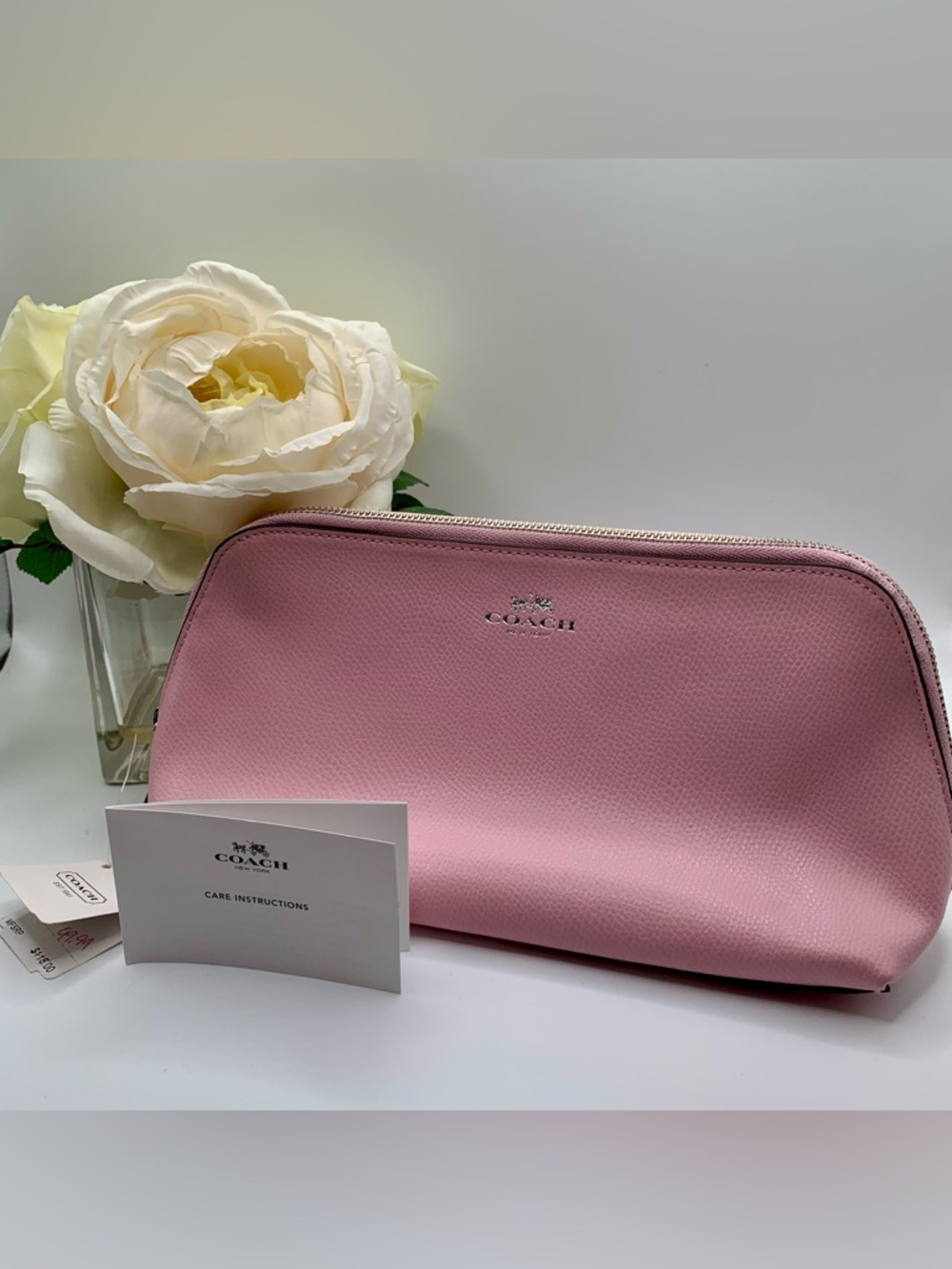 Coach Crossgrain Leather Cosmetic Case in the color Petal (model F53387). NWT
